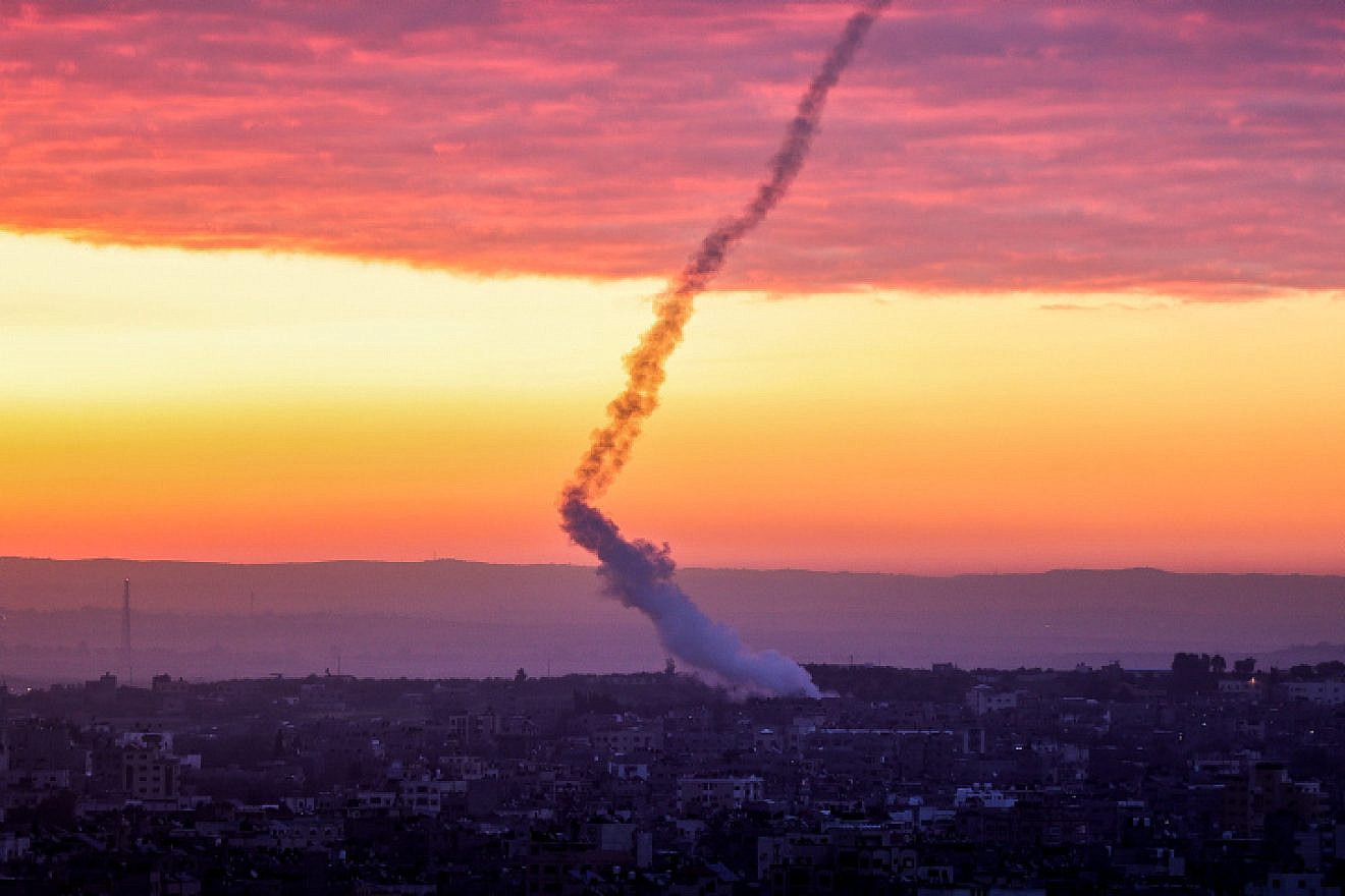 Trails of smoke are seen after rockets are fired from the Gaza Strip towards Israel, Feb. 23, 2023. Photo by Atia Mohammed/Flash90.
