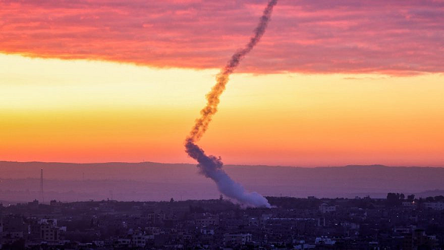 Trails of smoke are seen after rockets are fired from Gaza towards Israel, Feb. 23, 2023. Photo by Atia Mohammed/Flash90.