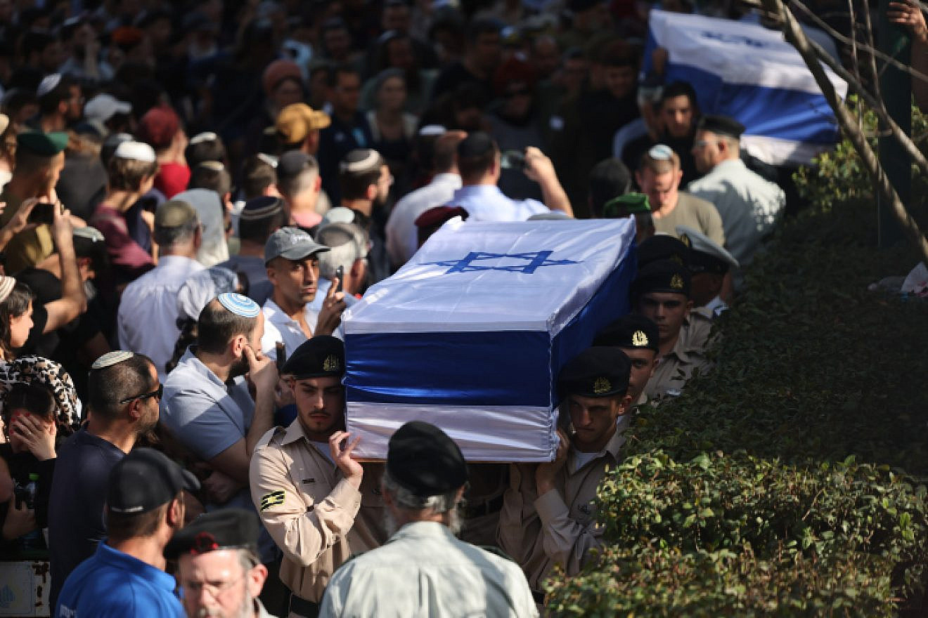 The funeral of brothers Hallel, 21, and Yagel Yaniv, 19, at Mount Herzl military cemetery in Jerusalem, on Feb. 27, 2023. The two brothers were shot dead by a terrorist in the village of Huwara in Samaria a day earlier. Photo by Yonatan Sindel/Flash90.