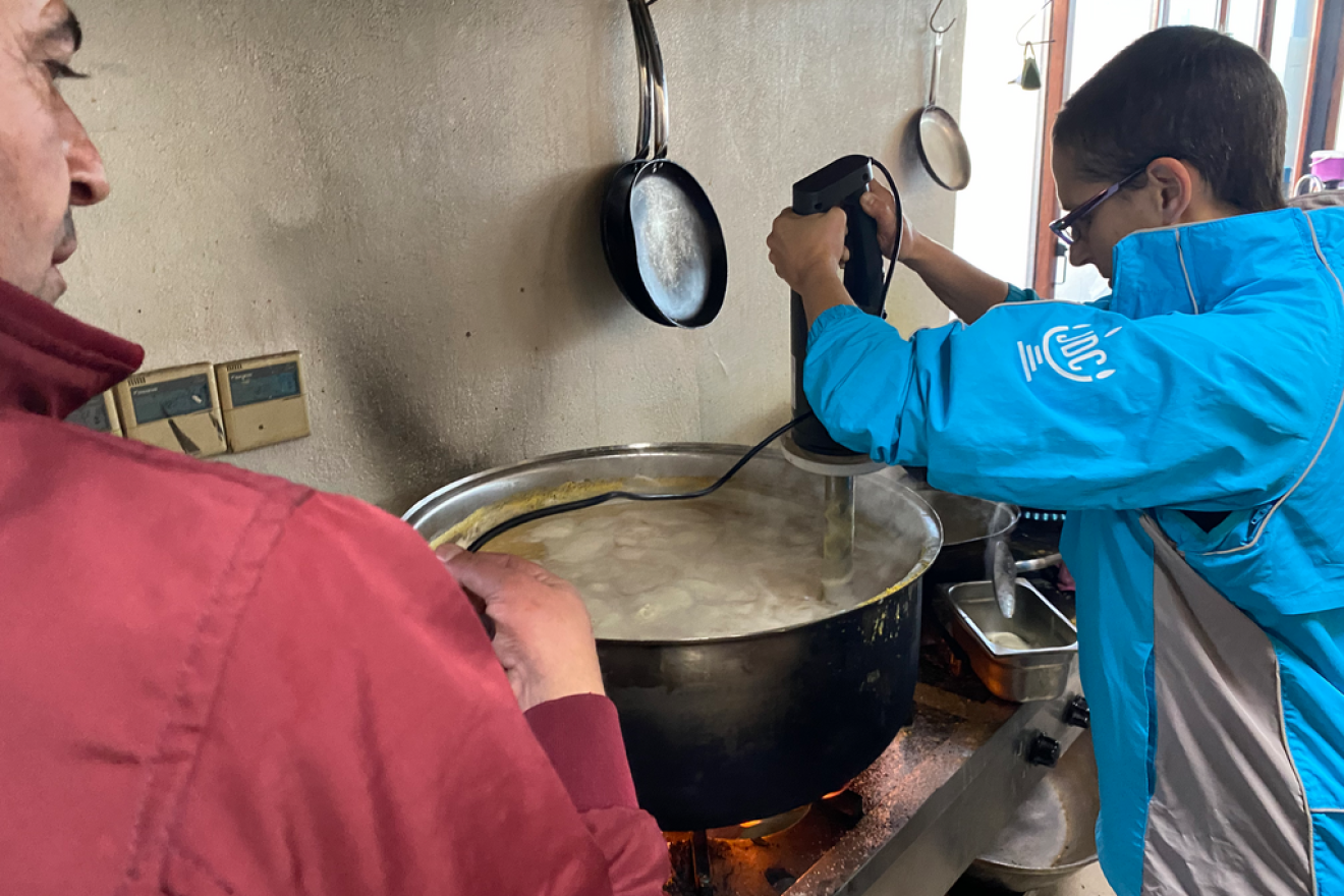 Leora Wine, director of disaster response for the American Jewish Joint Distribution Committee, helps make bread in a restaurant in Gaziantep, Turkey, February 2023. Photo courtesy of JDC.