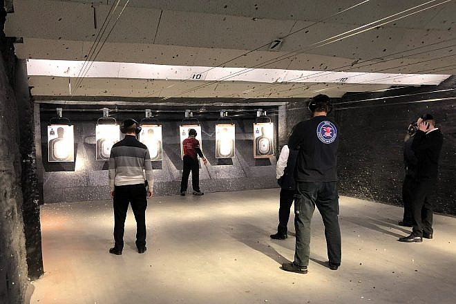 Members of NYS Jewish Gun Club practice at a firing range. Credit: Courtesy.