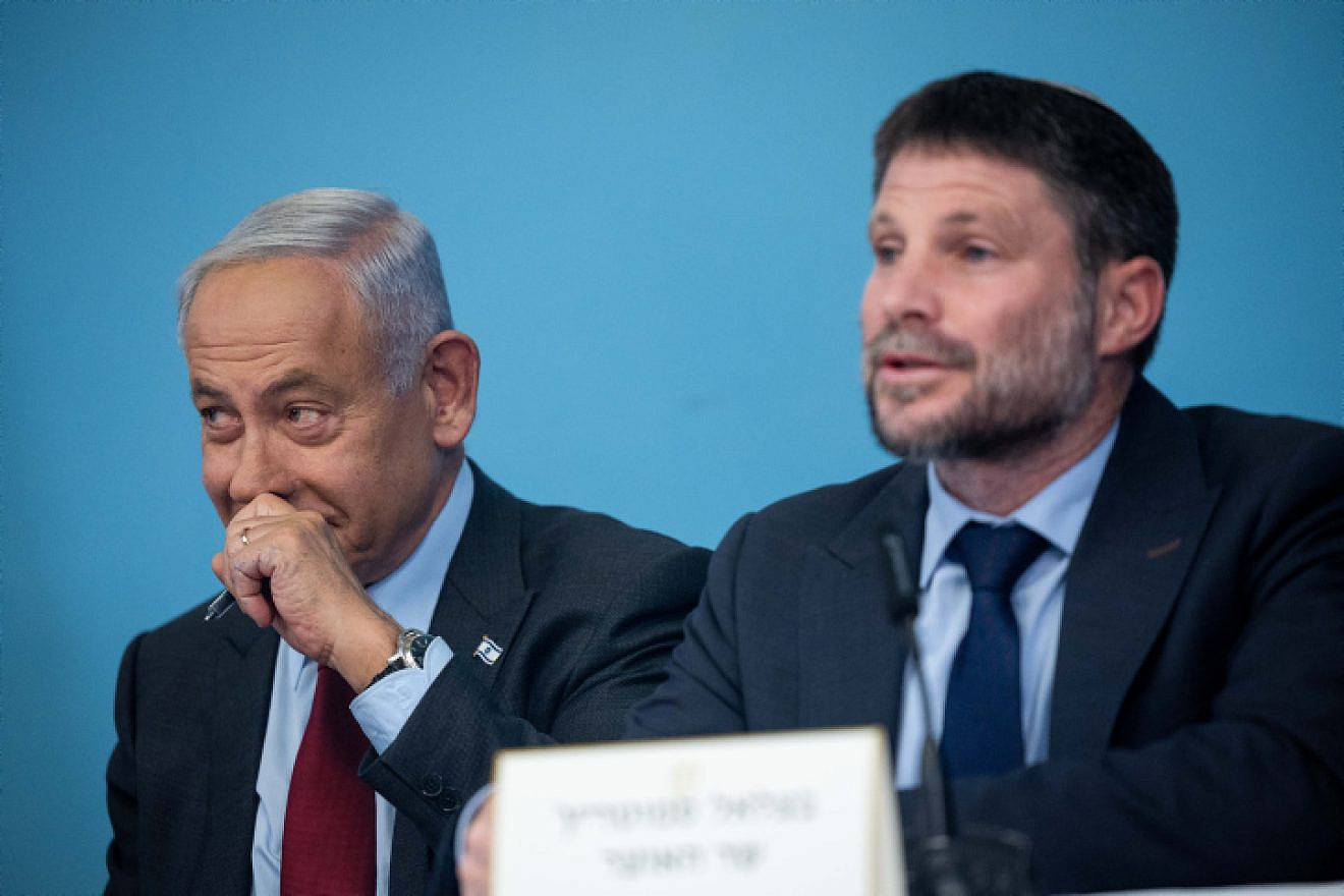 Israeli Prime Minister Benjamin Netanyahu and Finance Minister Bezalel Smotrich attend a press conference at the Prime Minister's Office in Jerusalem, Jan. 25, 2023. Photo by Yonatan Sindel/Flash90.