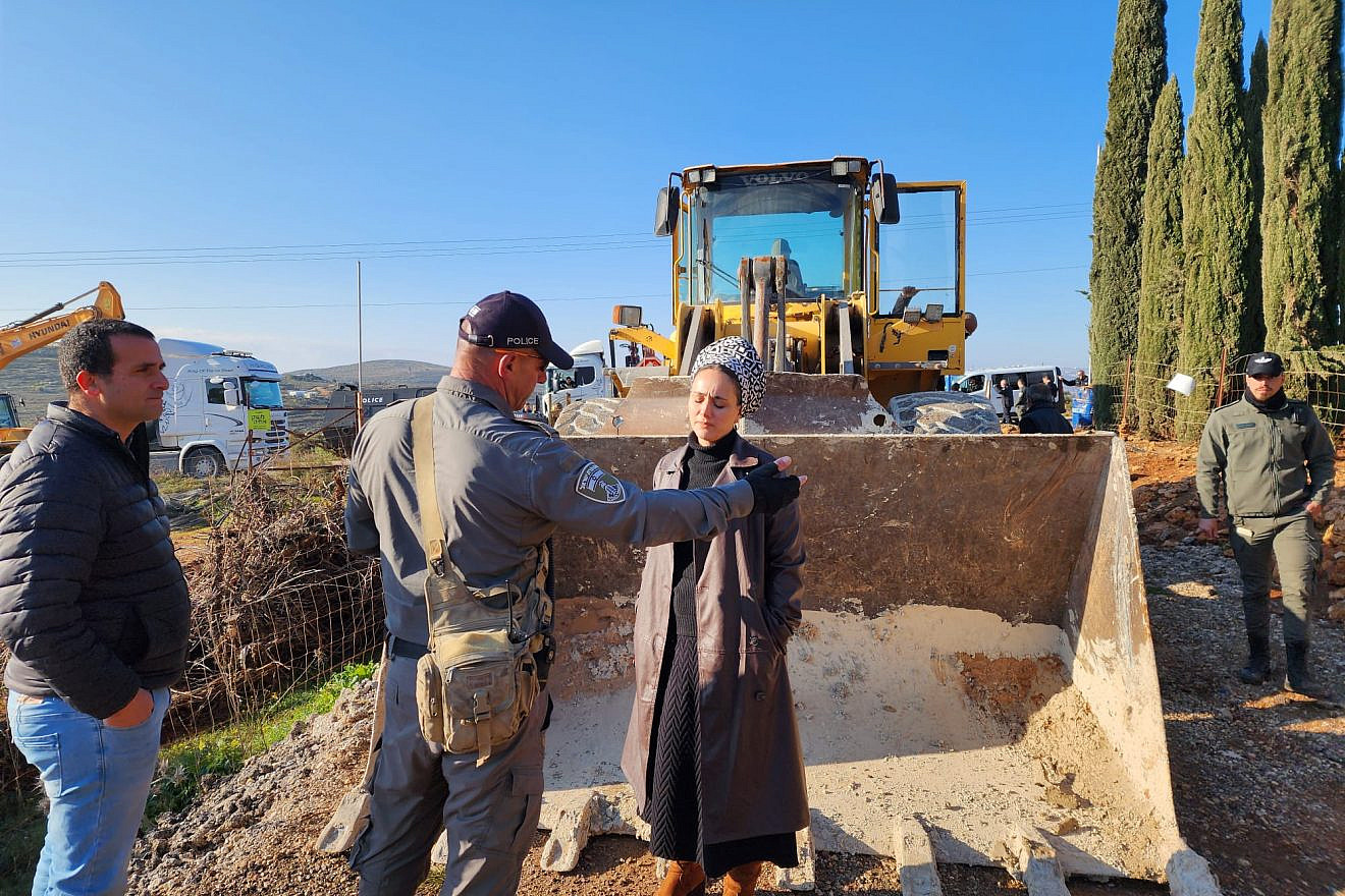 Otzma Yehudit lawmaker Limor Son Har-Melech attempts to block the demolition of a vineyard in the Shiloh Valley by the Civil Administration of the Defense Ministry, Feb. 15, 2023. Credit: Office of Limor Son Har-Melech.