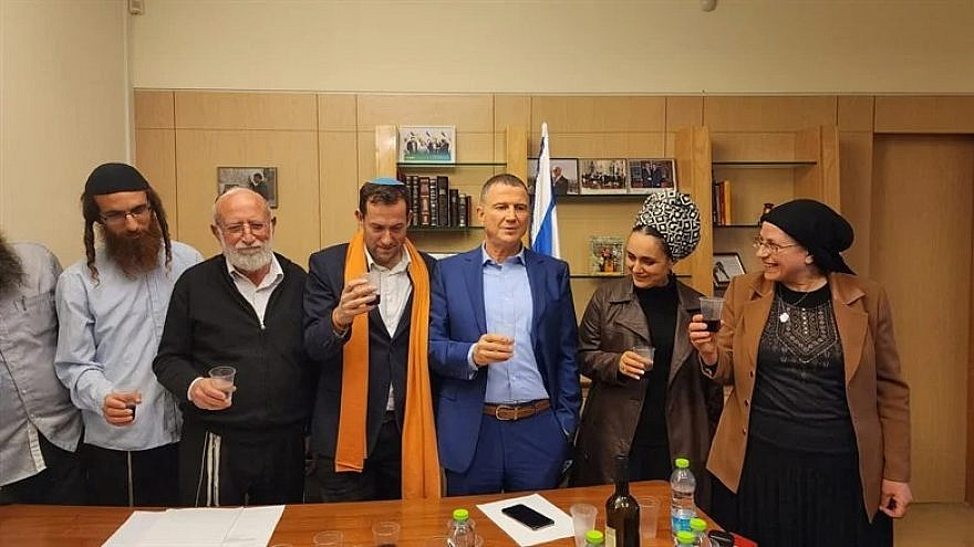 MKs Yuli Edelstein and Minister Orit Strock raise a toast with Samaria Regional Council chairman Yossi Dagan and others on Wednesday, Feb. 15, 2023. (Courtesy)