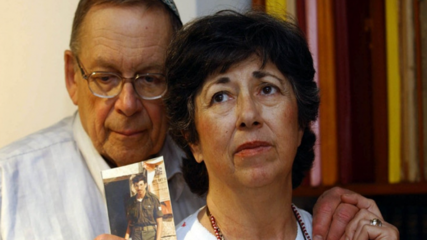 Yona and Miriam Baumel hold a picture of their missing son, Zachary. Credit: Courtesy.