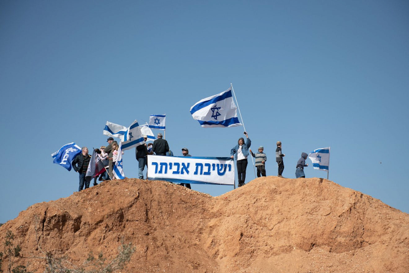 Jews protest for the return to Evyatar, near Nablus, or Shechem, Feb. 18, 2022. Photo by Sraya Diamant/Flash90.