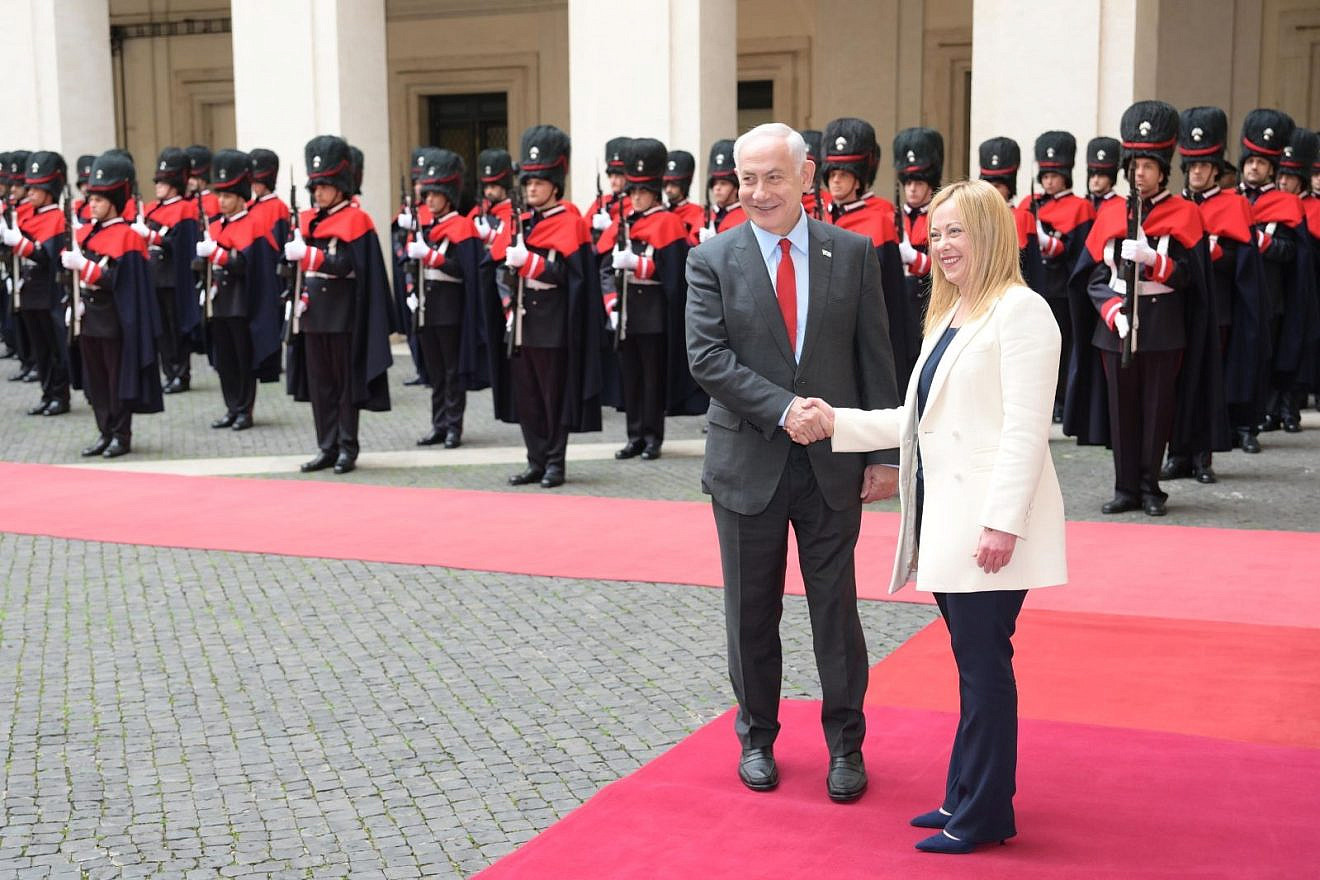 Israeli Prime Minister Benjamin Netanyahu is welcomed by an honor guard as he meets with Italian Prime Minister Giorgia Meloni at the Chigi Palace in Rome, Italy, on March 10, 2023. Credit: Amos Ben-Gershom/GPO.