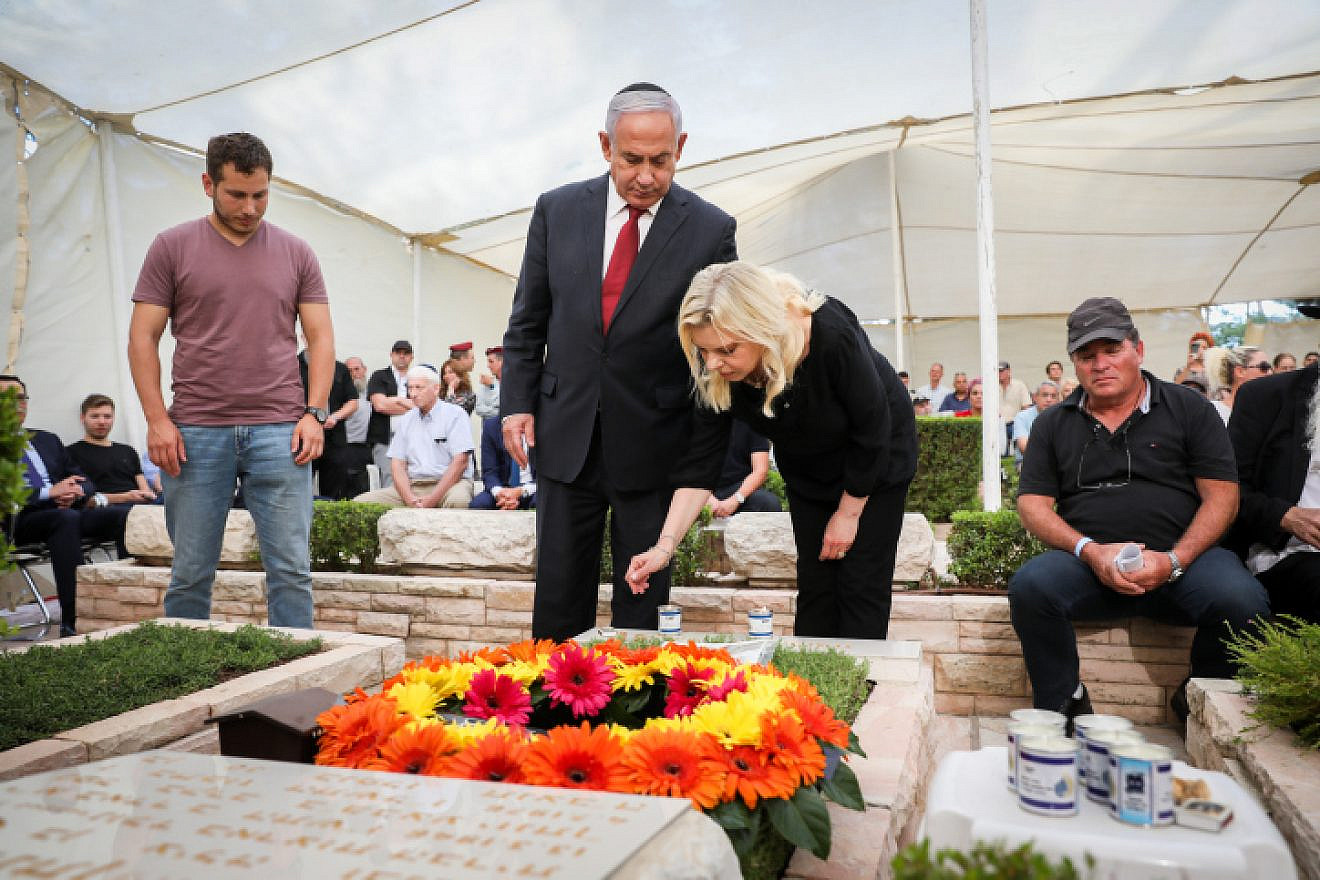 Benjamin Netanyahu and his wife, Sara, attend a memorial ceremony for Netanyahu's brother, Yoni Netanyahu, at the Mount Herzl Military Cemetery in Jerusalem on June 16, 2021. Photo by Olivier Fitoussi/Flash90.
