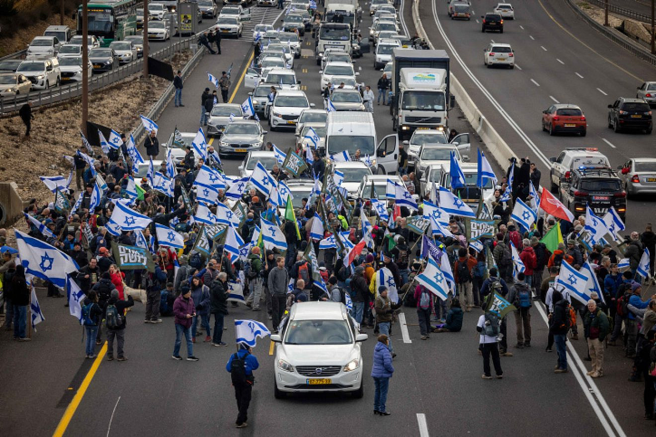 Protesters block Route 1 between Tel Aviv and Jerusalem over the Israeli government's judicial reforms, Feb. 9, 2023. Photo by Yonatan Sindel/Flash90.
