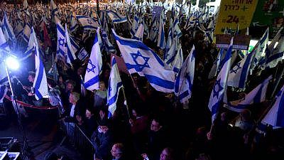 Thousands of protesters rally against Israeli government's judicial reform bills in the coastal city of Netanya on March 11, 2023. Photo by Gili Yaari/Flash90.