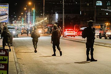Israeli security forces secure the scene of a shooting attack in Huwara, in Samaria, near Nablus, March 25, 2023. Photo by Nasser Ishtayeh/Flash90.