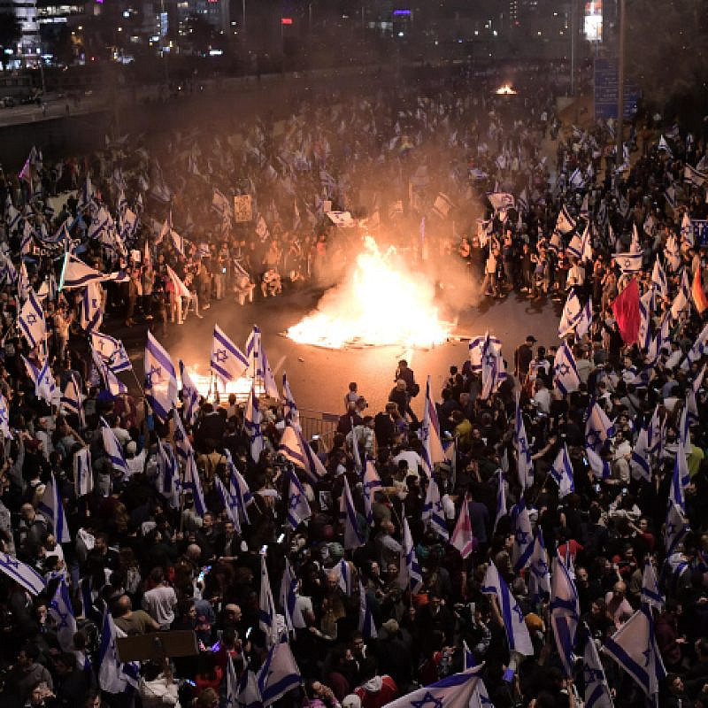 Israelis block the Ayalon Highway in Tel Aviv during a protest against the Israeli government's planned judicial overhaul on March 26, 2023. Photo by Tomer Neuberg/Flash90.