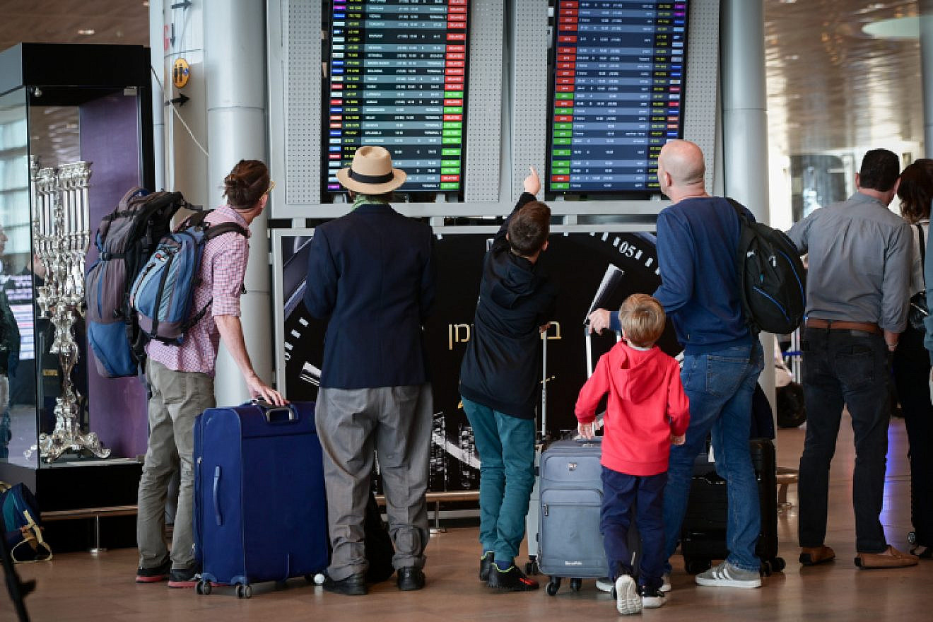 Travelers at Ben-Gurion International Airport, where flights were being delayed as workers went on strike to protest against the judicial overhaul proposed by the government, March 27, 2023. Photo by Avshalom Sassoni/Flash90.