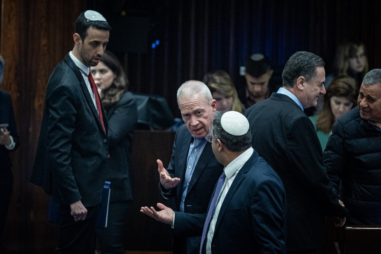 Defense Minister Yoav Gallant (center) speaks with National Security Minister Itamar Ben-Gvir after a vote at the Knesset in Jerusalem, Feb. 15, 2023. Photo by Yonatan Sindel/Flash90.