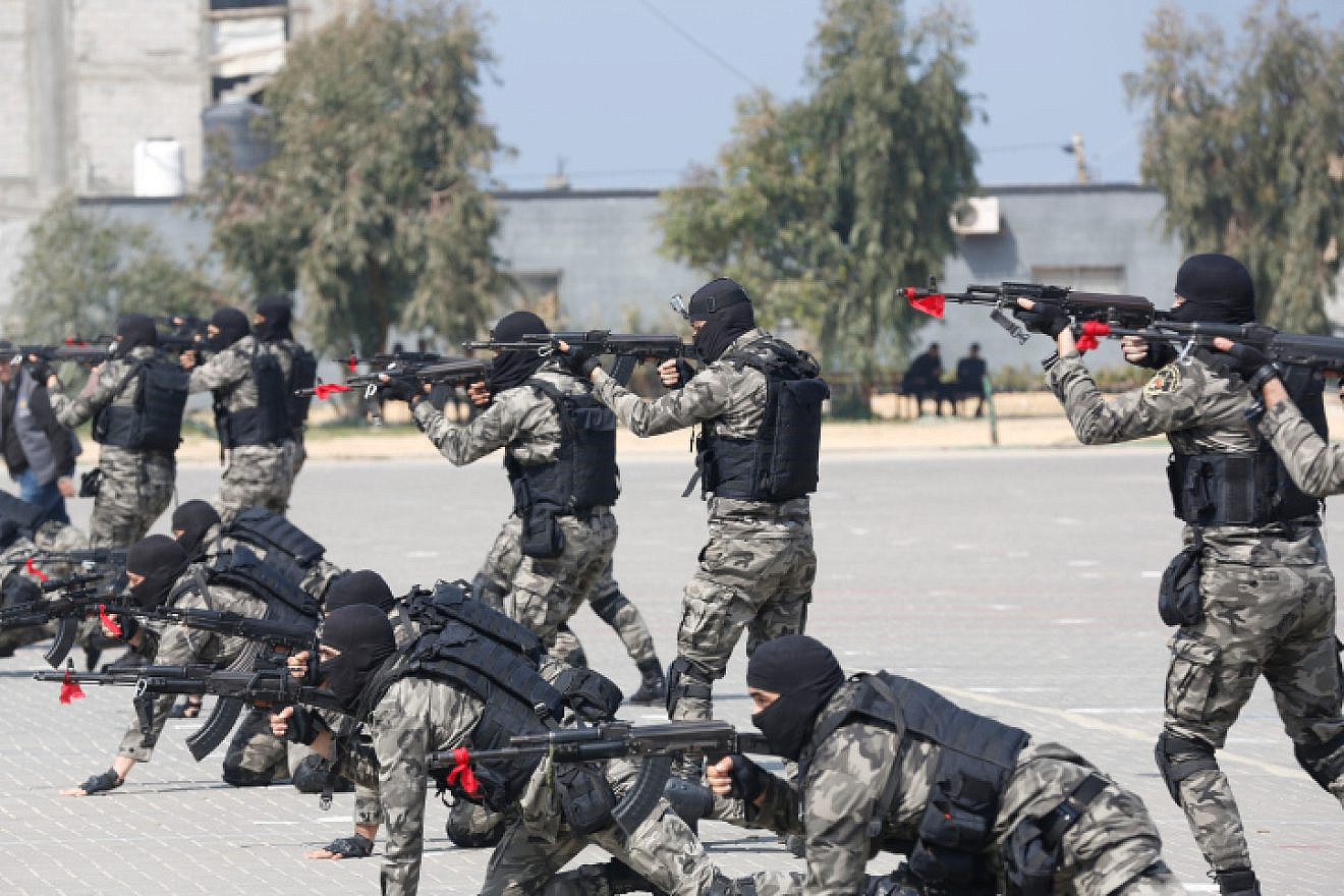 Hamas security personnel display their skills during an academy graduation ceremony in Gaza City, Feb. 27, 2023. Photo by Atia Mohammed/Flash90.