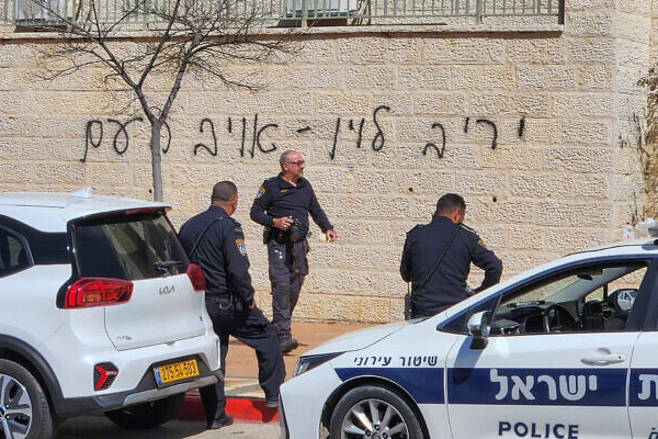 Graffiti branding Israeli Justice Minister Yariv Levin "the enemy of the people" is spray painted outside his home in Modiin, March 17, 2023. Photo by Jonathan Shaul/Flash90.