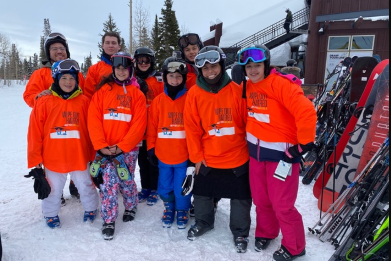 West Coast NCSY’s middle-school director and creator of its “Wipe Out Hate” program Rabbi Dani Locker (back left), with NCSY advisors and participants on ski slopes in Utah. Credit: Courtesy.