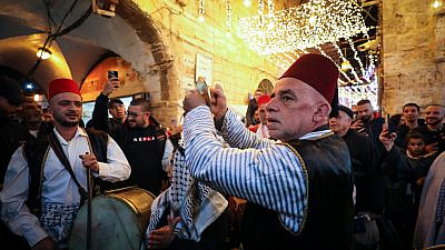 Palestinian Arabs celebrate the first night of the holy month of Ramadan in Jerusalem's Old City on March 23, 2023. Photo by Jamal Awad/Flash90.