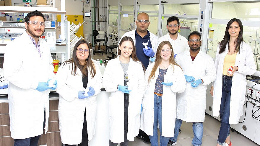 Technion–Israel Institute of Technology Professor Shady Farah (standing, far left) and members of his research team in Haifa, Israel. Credit: Courtesy of the Technion Israel-Institute of Technology.