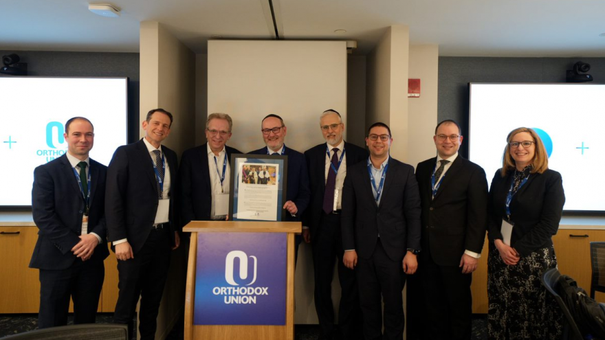 From left: National director of the OU's Community Projects and Partnerships Rabbi Simon Taylor; OU executive vice president and COO Rabbi Dr. Josh Joseph; United Synagogue president Michael Goldstein; OU president Mitchel Aeder; OU executive vice president Rabbi Moshe Hauer; United Synagogue COO David Collins; United Synagogue Trustee Saul Taylor; and United Synagogue CEO Jo Grose. Credit: Courtesy.