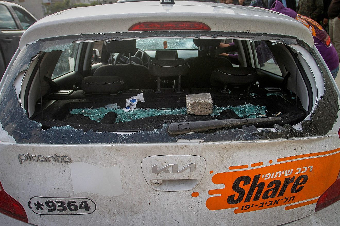 The smashed back window of a car driven by German tourists, attacked by Palestinian youth in Nablus in the West Bank on March 18, 2023. Photo by Nasser Ishtayeh/Flash90.
