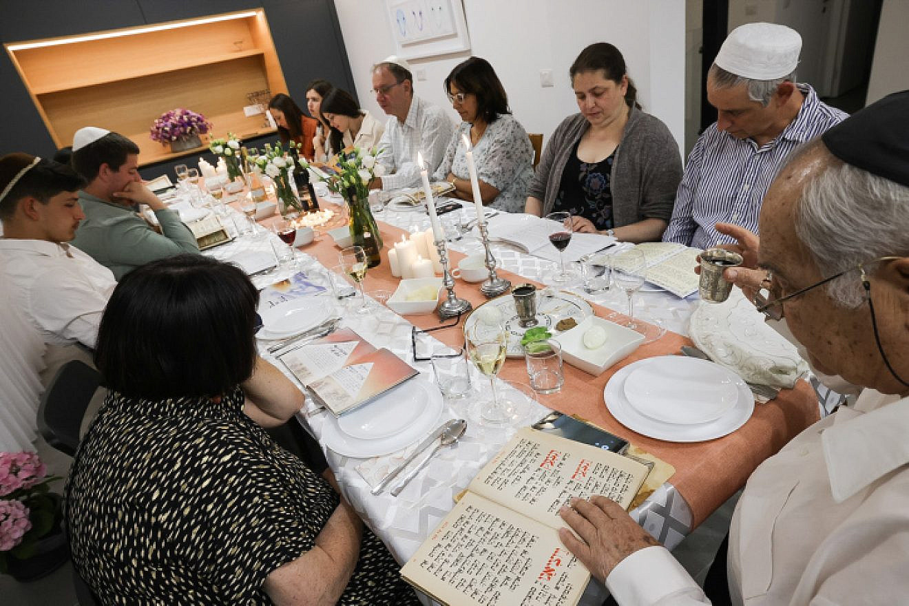 Israelis attend a Passover seder in Mishmar David, April 15, 2022. Photo by Nati Shohat/Flash90.