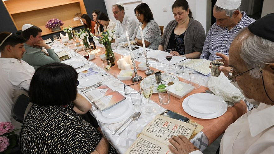 Israelis attend a Passover seder in Mishmar David, April 15, 2022. Photo by Nati Shohat/Flash90.