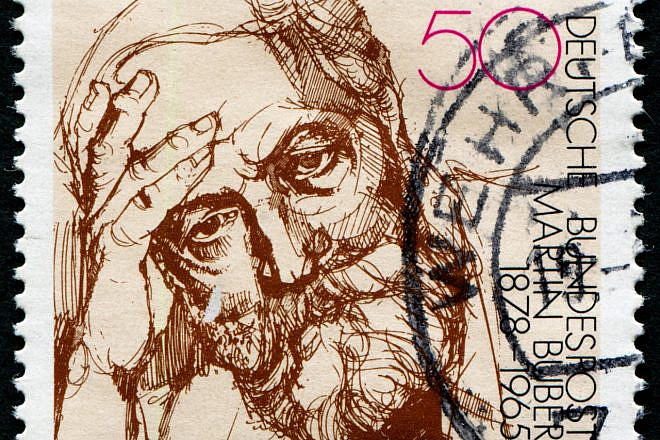 A stamp printed in Germany shows portrait Martin Buber, circa 1978. Credit: Galyamin Sergej/Shutterstock.
