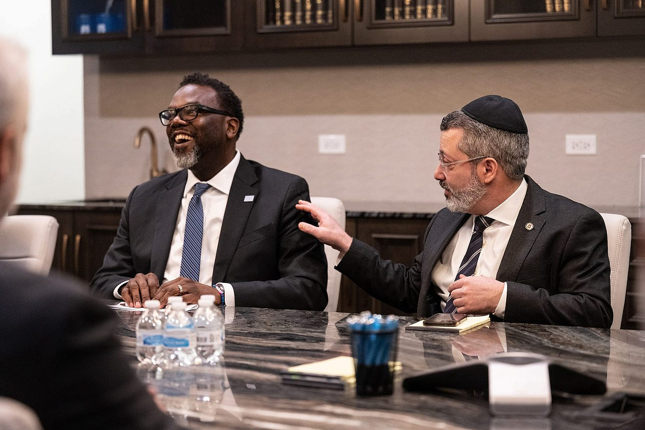 Rabbi Shlomo Soroka, director of government affairs at Agudath Israel of Illinois, and Chicago mayorial candidate Brandon Johnson at a meeting prior to Johnson's election win on April 5, 2023. Credit: Agudath Israel of Illinois.