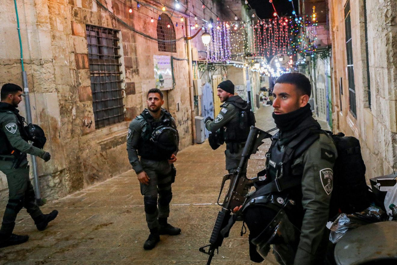 Security personnel at the scene in Jerusalem's Old City where a man was shot dead after trying to steal a police officer’s weapon, April 1, 2023. Photo by Jamal Awad/Flash90.