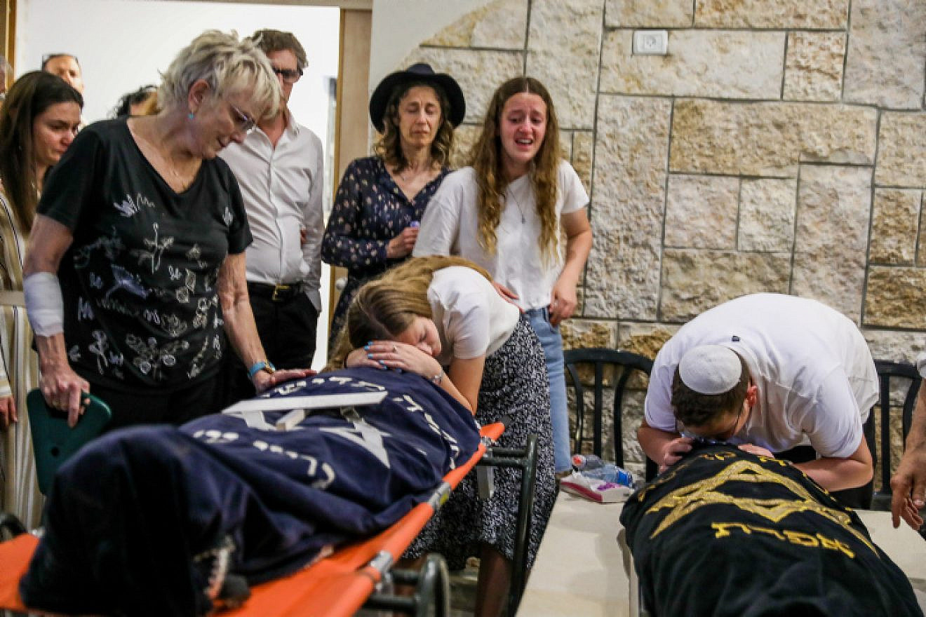 Family members and mourners attend the funeral of terror victims Maia, 20, and Rina, 15, Dee on April 9, 2023. Photo by Noam Revkin Fenton/Flash90.
