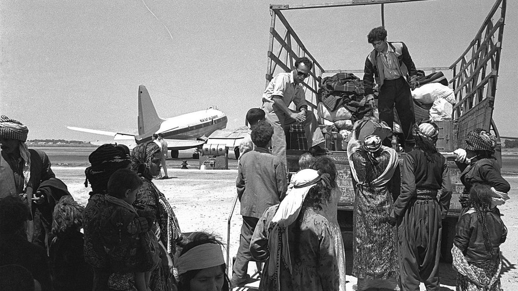 Jewish refugees from Iraq leave Lod (today Ben-Gurion) Airport, 1951. Credit: GPO via Wikimedia Commons.