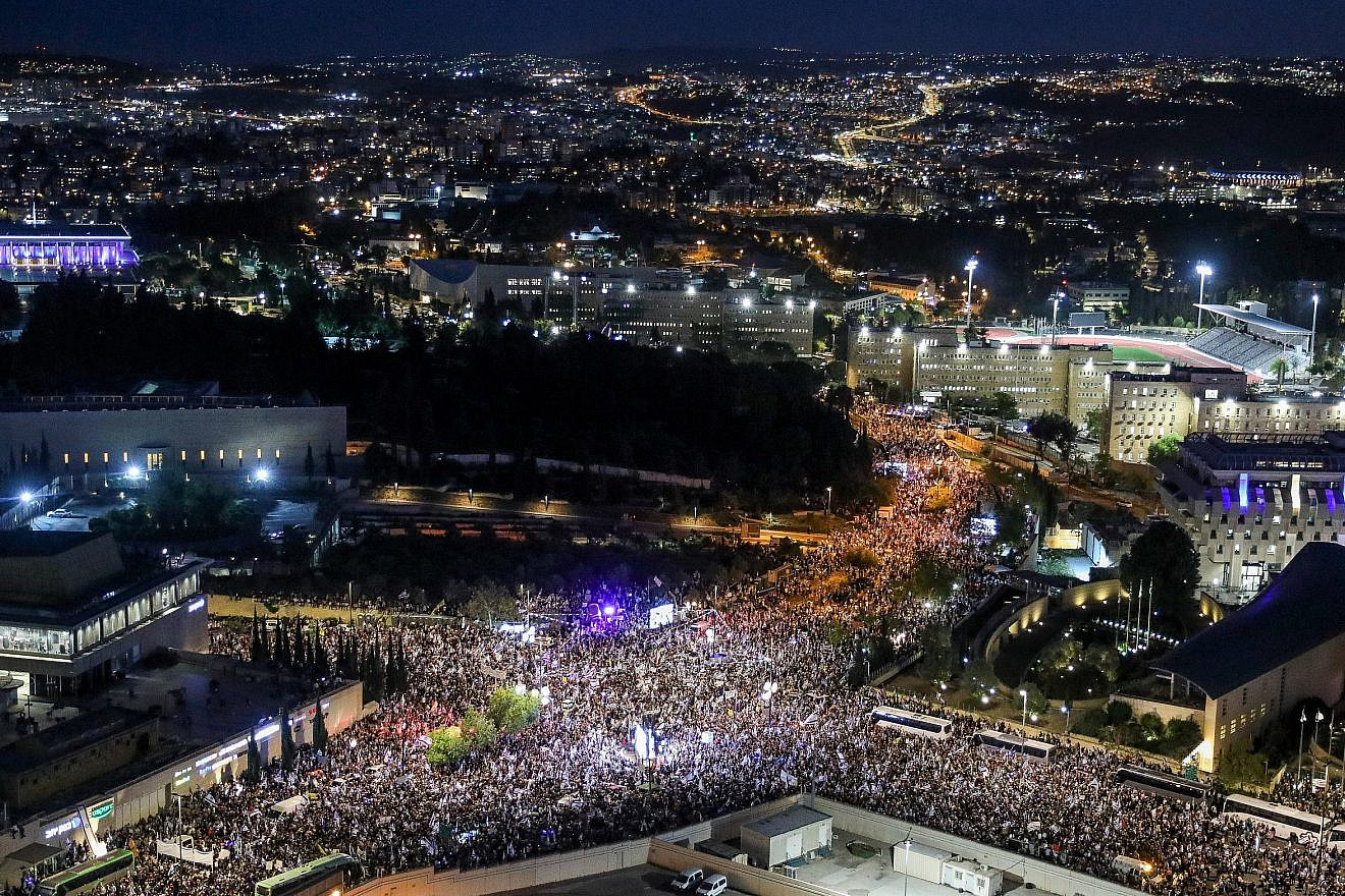 Israelis attend a rally in support of the government's planned judicial overhaul, outside of the Knesset on April 27, 2023. Photo by Flash90.