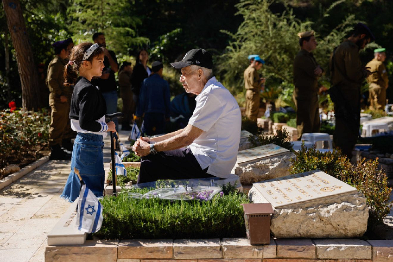 Bereaved families visit the graves of fallen soldiers on Memorial Day at Mount Herzl Military Cemetery in Jerusalem, April 25, 2023. Photo by Erik Marmor/Flash90.