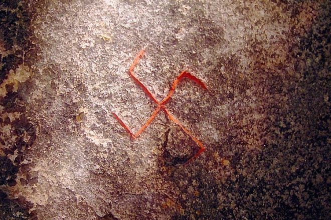 A photograph of the swastika on the Snoldelev stone in the National Museum in Copenhagen, Denmark. Credit: Wikimedia Commons.