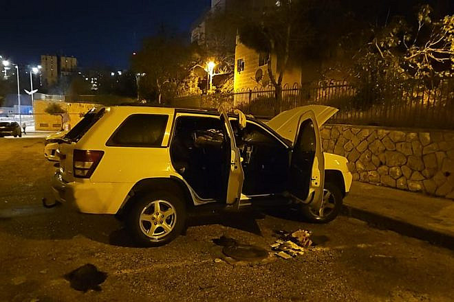 A vehicle damaged in an act of suspected nationalistic vandalism on April 17, 2023 in the Neve Yakov neighborhood of Jerusalem. Credit: Police Spokesperson