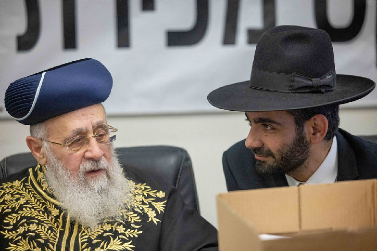 Sephardic Chief Rabbi Yitzhak Yosef (left) with Religions Services Minister Michael Michieli at a ceremony in Jerusalem selling the state's chametz, April 4, 2023. Photo by Yonatan Sindel/Flash90.
