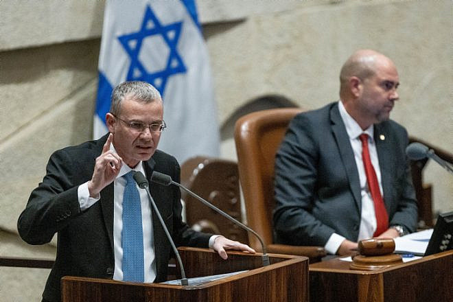 Justice Minister Yariv Levin (left) addresses the Knesset during a debate on the government's judicial reform program, Feb. 20, 2023. Photo by Yonatan Sindel/Flash90.