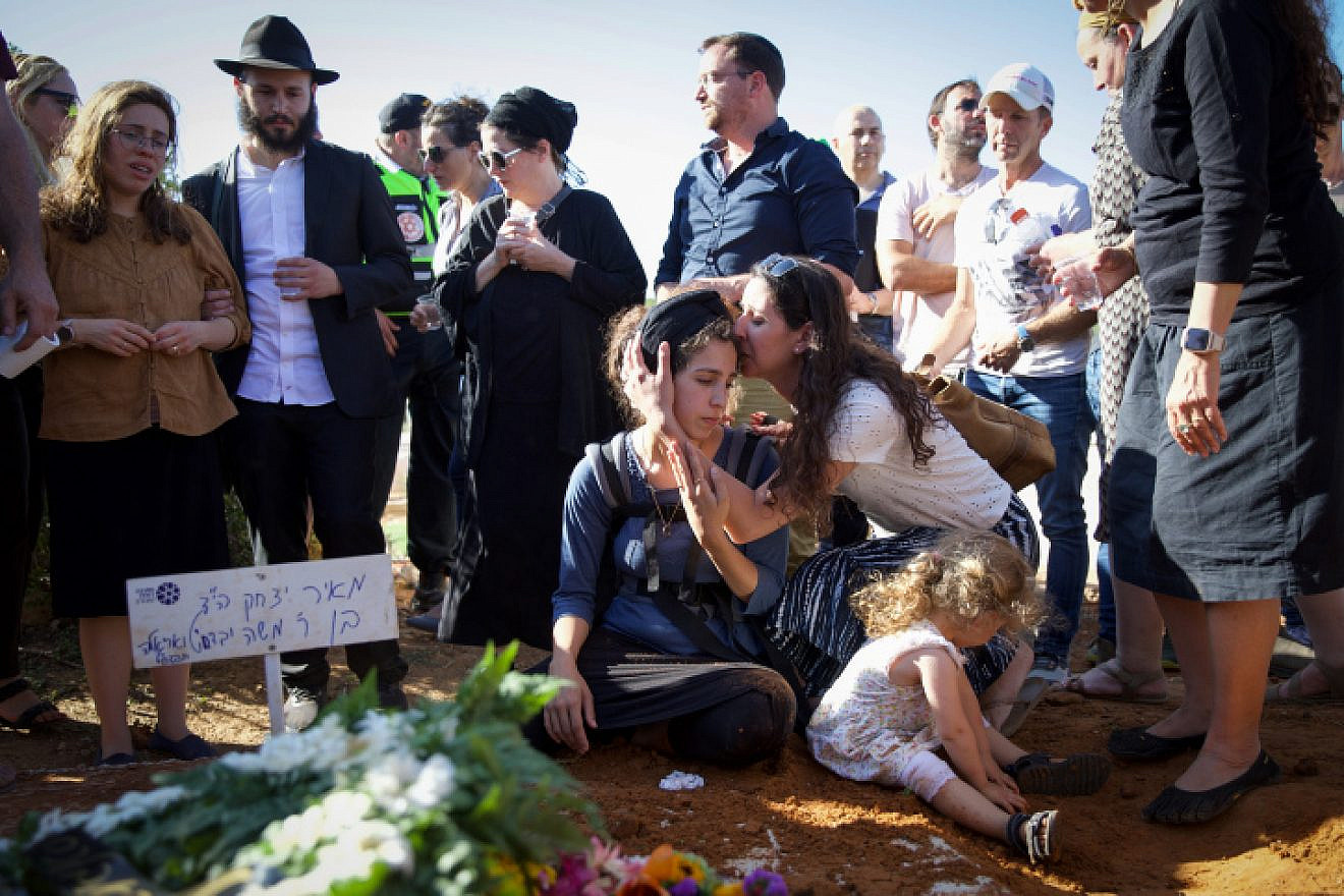 Tal Tamari attends the funeral of her husband, Meir, in Shaked, Samaria, May 31, 2023. Photo by Shir Torem/Flash90.
