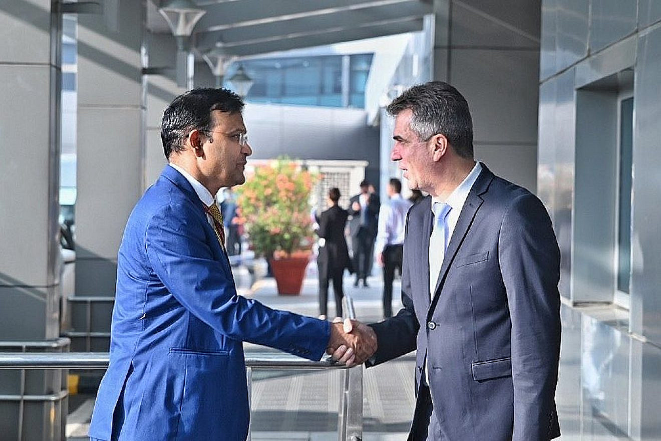 Israel's Foreign Minister Eli Cohen, right, is greeted by Official Spokesperson for the Indian Ministry of External Affairs Arindam Bagchi upon his arrival to New Delhi on May 9, 2023. Source: Twitter.