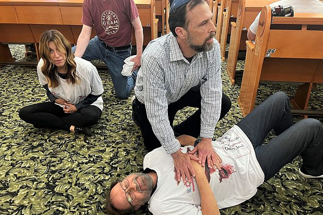 Staff members and attendees of Chabad of Poway, Calif., attend an emergency-services training seminar sponsored by Magen David Adom. Credit: MDA.