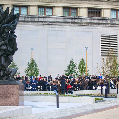 The dedication of the Horwitz-Wasserman Holocaust Memorial Plaza at 16th and Arch Streets on the Benjamin Franklin Parkway in Philadelphia. The sculpture on the left, Monument to Six Million Jewish Martyrs by Holocaust survivor Nathan Rapoport, was originally dedicated at this site in 1964. Credit: Campramah via Wikimedia Commons.