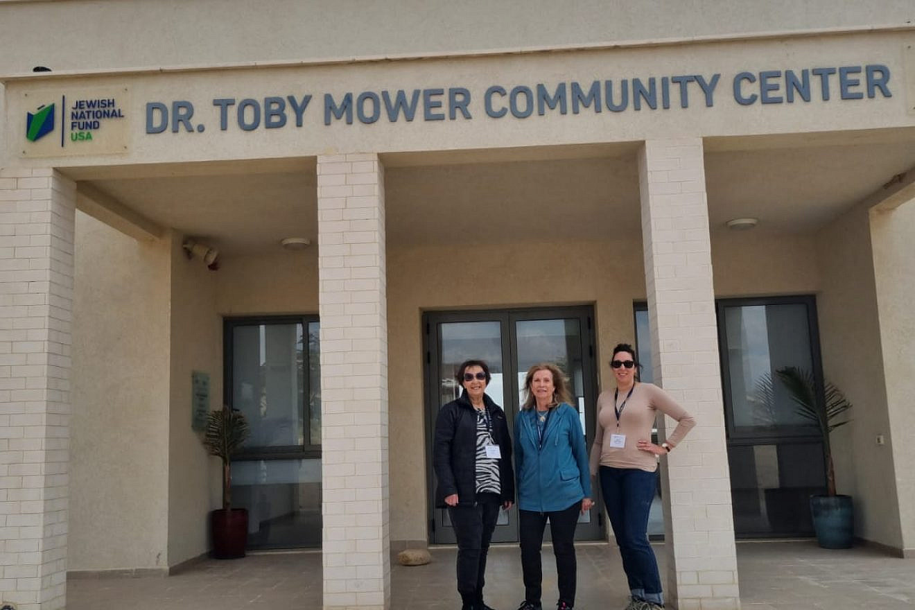 Eileen Lash; Jewish National Fund-USA Women for Israel President, Barbara Burry; and Julia Rymer Brucker in front of the Dr. Toby Mower community center in Zuqim.