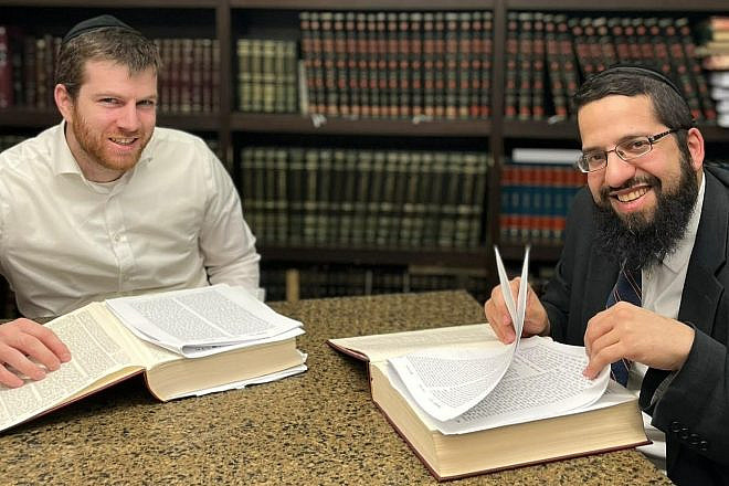 Rabbi Moshe Revah with a student at Hebrew Theological College in Skokie, Ill. Credit: Courtesy.