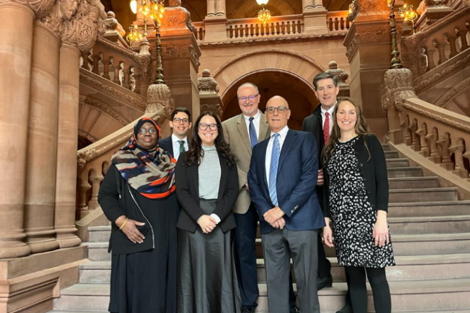 L-R, at the New York State Capitol: Islamic Cultural Center School Principal Khadijah Jean Pryce; Regis High School Vice President for Development James Kennedy; Teach NYS Executive Director Sydney Altfield; New York State Catholic Conference Director for Education James Cultrara; Teach NYS Co-founder and Board Chair Sam Sutton; Cristo Rey New York High School President Dan Dougherty; Partnership Schools Chief Operating Officer Kathleen Quirk