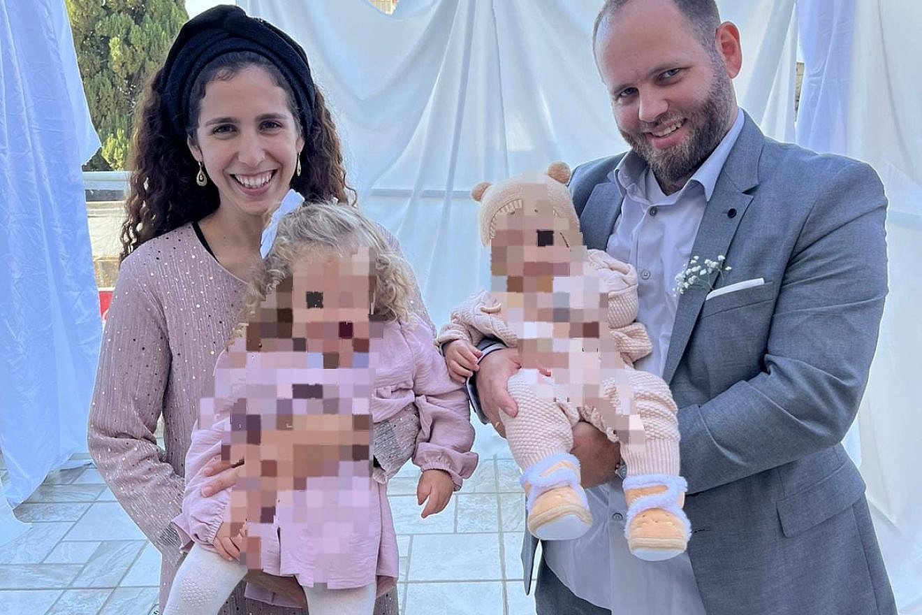 Meir Tamari, who was killed in a terror shooting attack in northwestern Samaria on May 30, 2023, pictured with his wife and children. Picture courtesy of the victim's family.