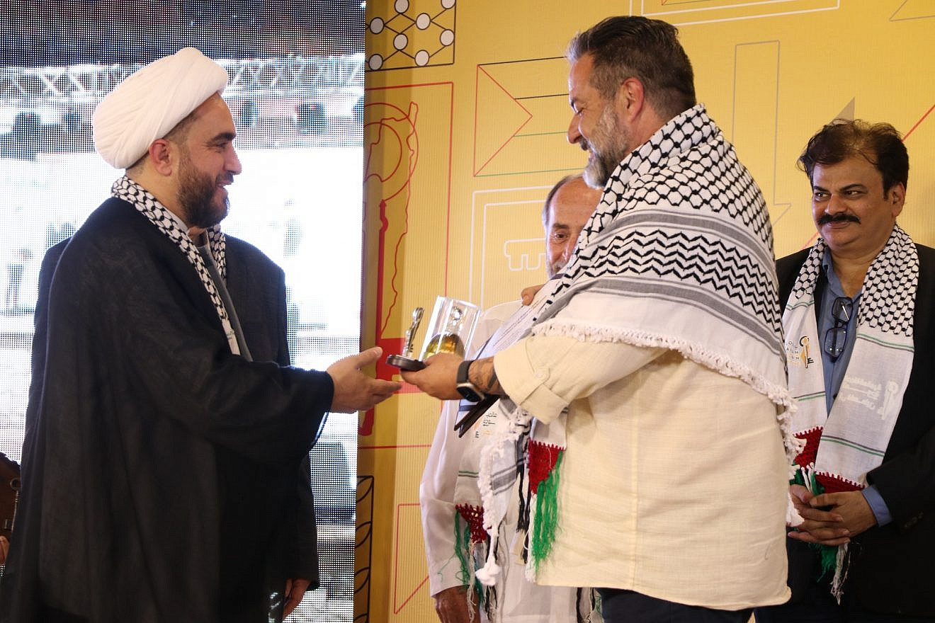 GCRP general coordinator Sheikh Yusuf Abbas presents an award to MEP Manuel Pineda at a ceremony in Beirut, May 29, 2023. Source: Facebook.