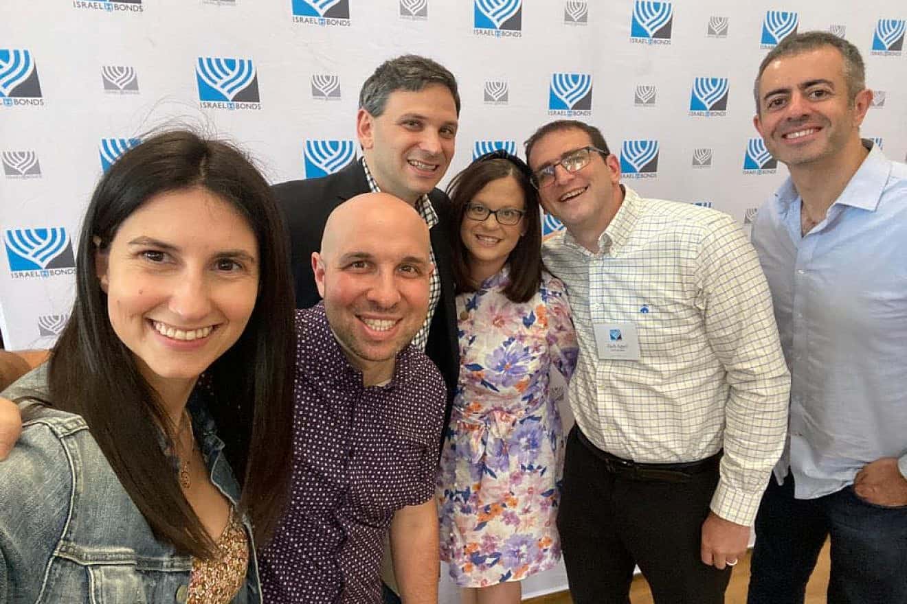 From left: At the Israel Bonds Summer Bash at Binny’s Beverage Depot in Chicago are Aliza Fagen, National New Leadership co-chair; Vinnie Pine, National New Leadership Council member; Micah Cohen, National Director New Leadership; Teri Herbstman Appel, Chicago New Leadership chair; Zach Appel, Summer Bash Host Committee member; and Albert Babayev, National New Leadership co-chair, on June 22, 2023. Credit: Courtesy of Israel Bonds.