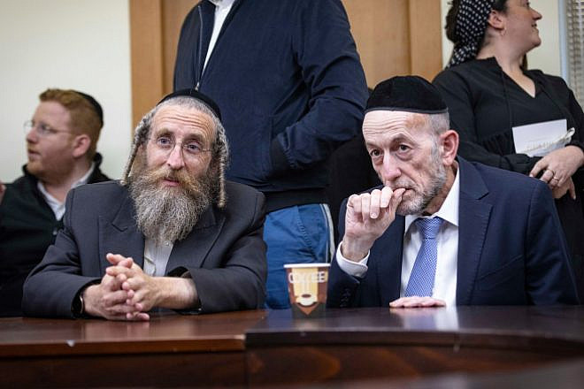 UTJ Knesset members Ya'akov Tessler and Uri Maklev attend a party meeting at the Knesset, Dec. 5, 2022. Credit: Olivier Fitoussi/Flash90.
