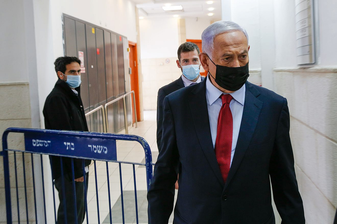 Then-former Prime Minister Benjamin Netanyahu arrives at Jerusalem District Court to hear testimony in his trial, March 23, 2022. Photo by Shalev Shalom/TPS.